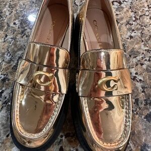 Gold coach loafers